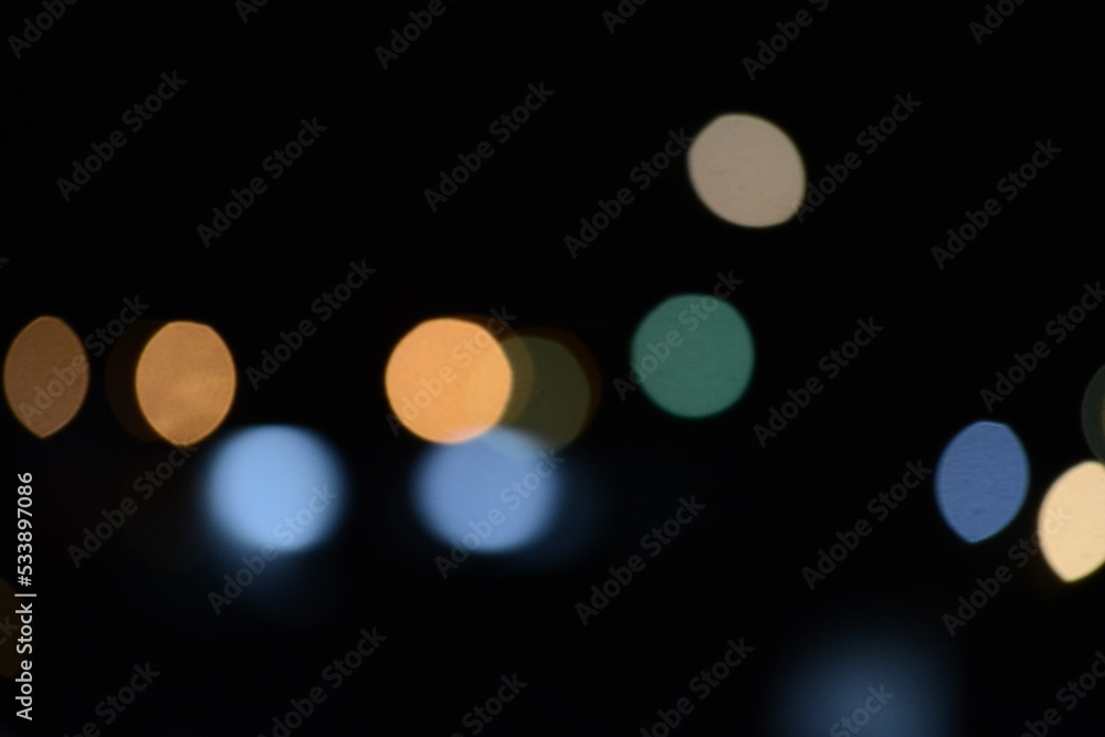 Abstract background. blur bokeh. Blurry multicolor light from the lamp in the distance Abstract background. blur bokeh. Blurry multicolor light from the lamp in the distance