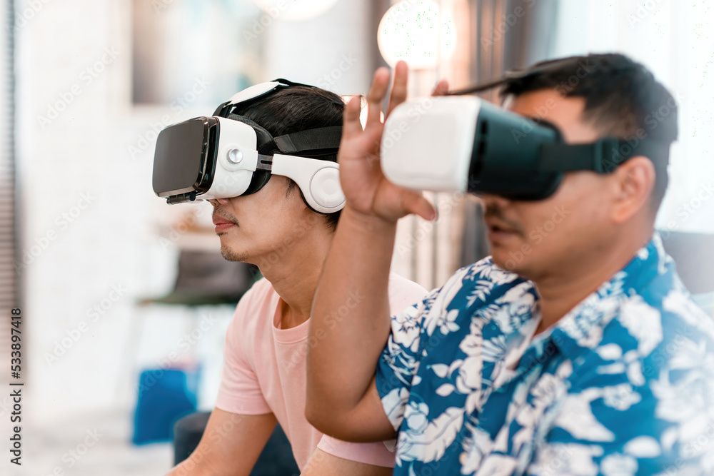 excited happy friends play vr glasses. future gaming technology device make male players enjoy competitive each other for fun. brothers wearing innovation virtual reality headset join in cyber world excited happy friends play vr glasses. future gaming technology device make male players enjoy competitive each other for fun. brothers wearing innovation virtual reality headset join in cyber world