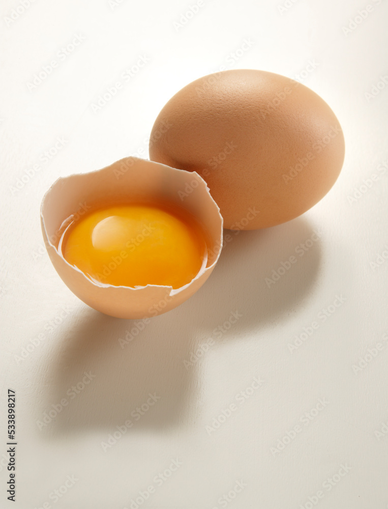 fresh broken egg on white background fresh broken egg on white background