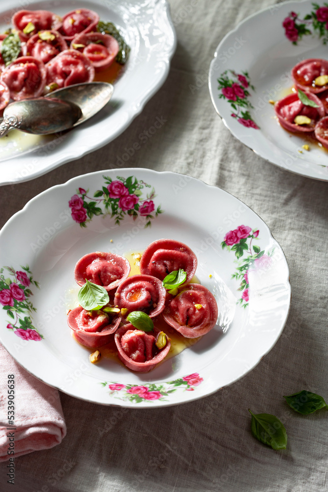 Beetroot ravioli with goat cheese, mozzarella, parmesan, butter sauce Beetroot ravioli with goat cheese, mozzarella, parmesan, butter sauce