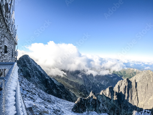 View from the top of Lomnicki Stit Peak in High Tatras, Slovakia. Mountain trip photo