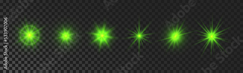 Set of green glowing sparkling stars