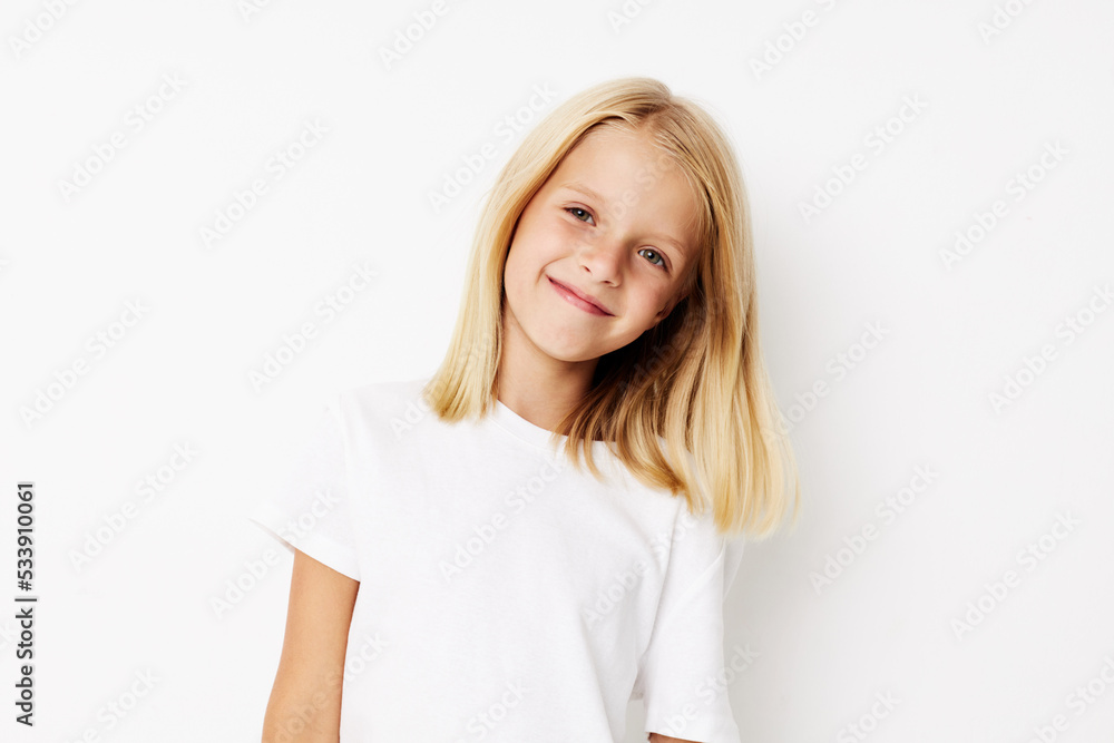 Fototapeta premium Portrait of a smiling little cutie fashionable baby clothes posing studio