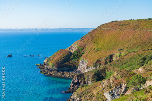 Landscape view along the famous GR34 hiking track from Cap de la chevre (cape of the goat) to Morgat, Brittany, France. Blue sky on the background.