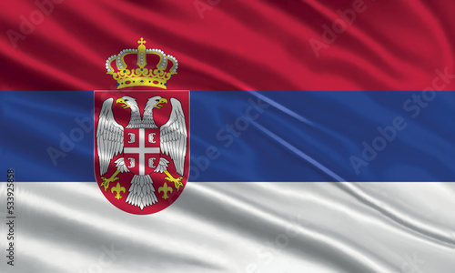 Serbia flag design. Waving Serbian flag made of satin or silk fabric. Vector Illustration.