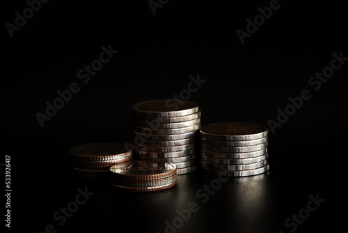 Wallpaper Mural Stack of coins on black background, Saving money concept Torontodigital.ca