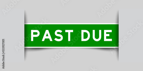 Inserted green color label sticker with word past due on gray background