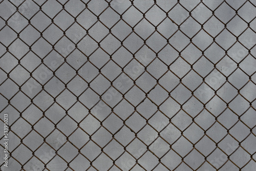 Metal fence on concrete wall, texture and background graphic resource