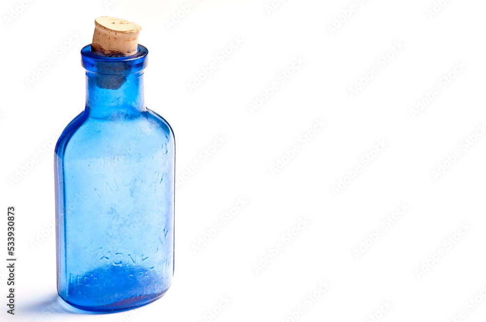 blue antique glass bottle isolated blue antique glass bottle isolated