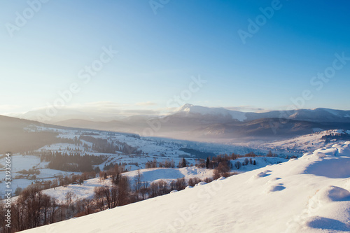 winter landscape with mountains on horizon. fir trees covered with snow. beautiful winter landscape. Carpatian mountains © ver0nicka
