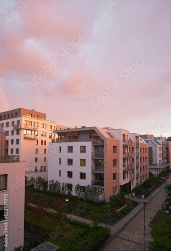 Contemporary resident complex in Europe during summer evening. Concept of happy living in the modern house. Owning a real estate concept. © AlexGo