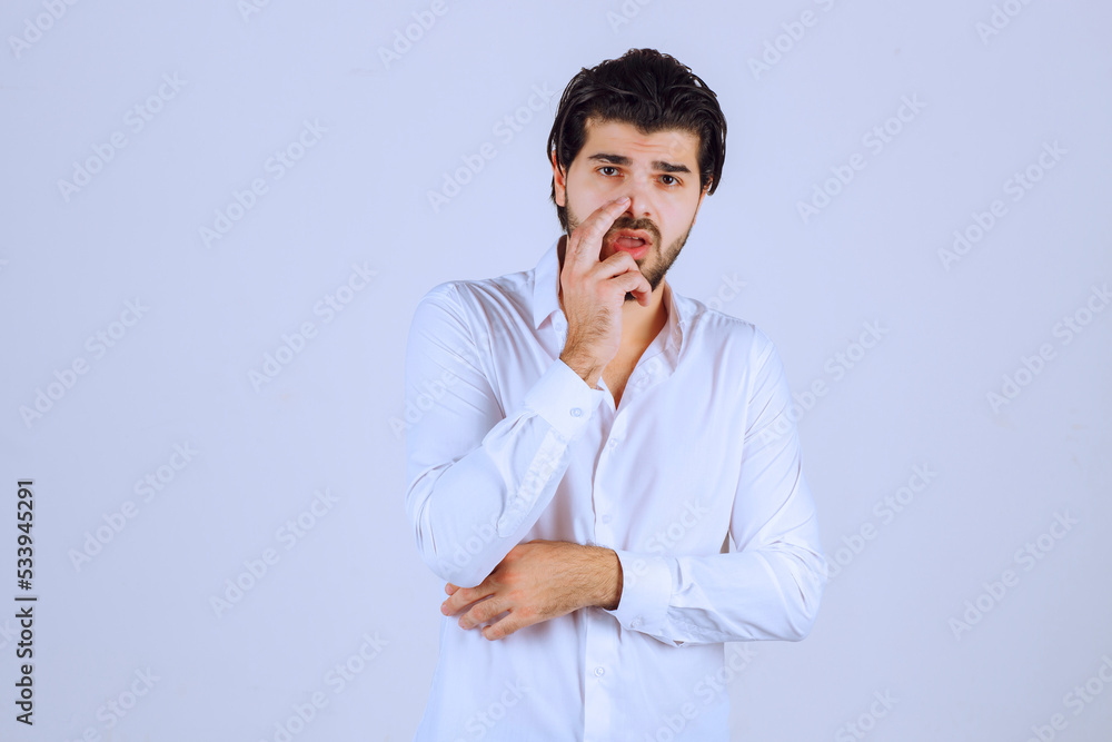 Man looks doubtful and thinking or analizing Man looks doubtful and thinking or analizing