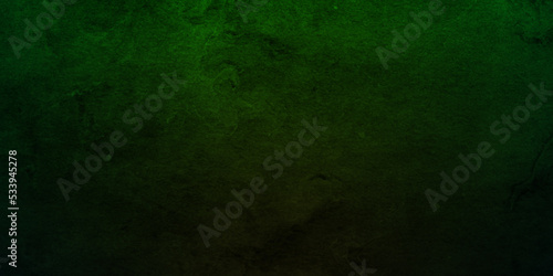 Black and green stone grunge concrete cement blackboard chalkboard wall floor texture. Black anthracite dark green grunge old texture panorama backdrop background.