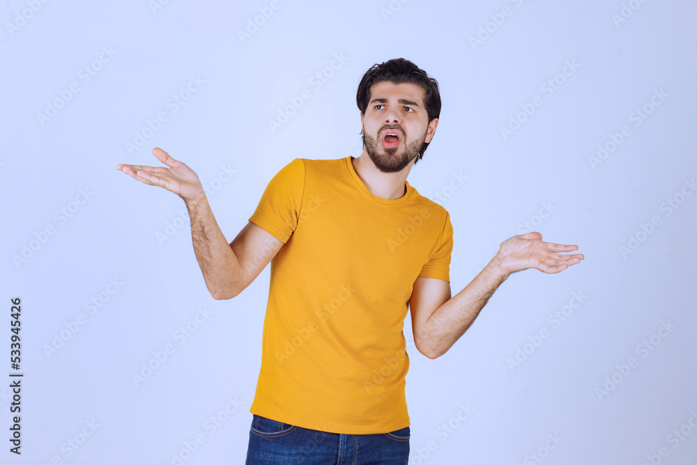 Man looks confused and unexperienced about something