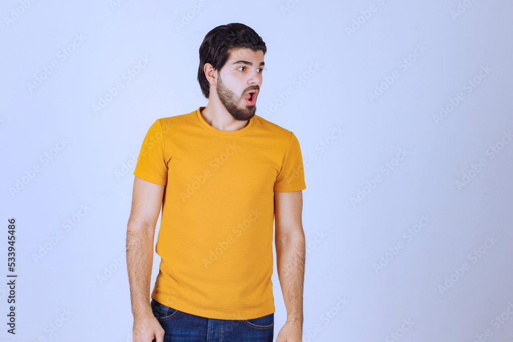 Man looks confused and unexperienced about something Man looks confused and unexperienced about something