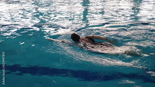 Wallpaper Mural a woman is engaged in swimming in the pool, a healthy lifestyle Torontodigital.ca