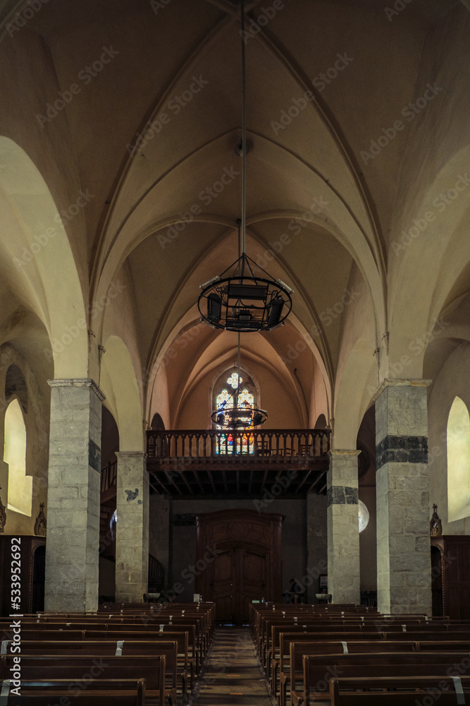 The restored interior of Saint Pierre aux Liens Medieval church in Quintenas in Ardeche (France)