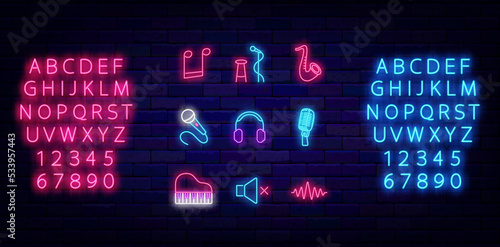 Music neon icons collection. Luminous pink and blue alphabet. Stand up symbol. Vector stock illustration