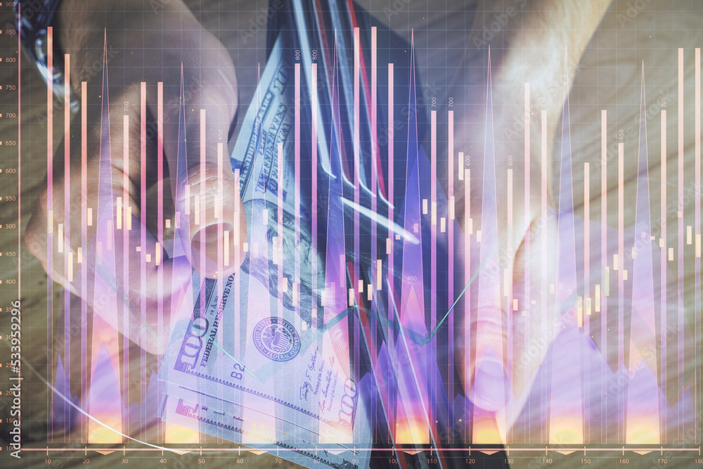 Multi exposure of forex graph drawing hologram and USA dollars bills and man hands. Technical Analysis concept. Multi exposure of forex graph drawing hologram and USA dollars bills and man hands. Technical Analysis concept.