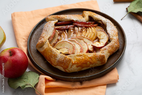 Autumn apple tart rustic food on plate pie