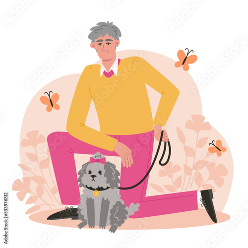 Elderly man walking his dog