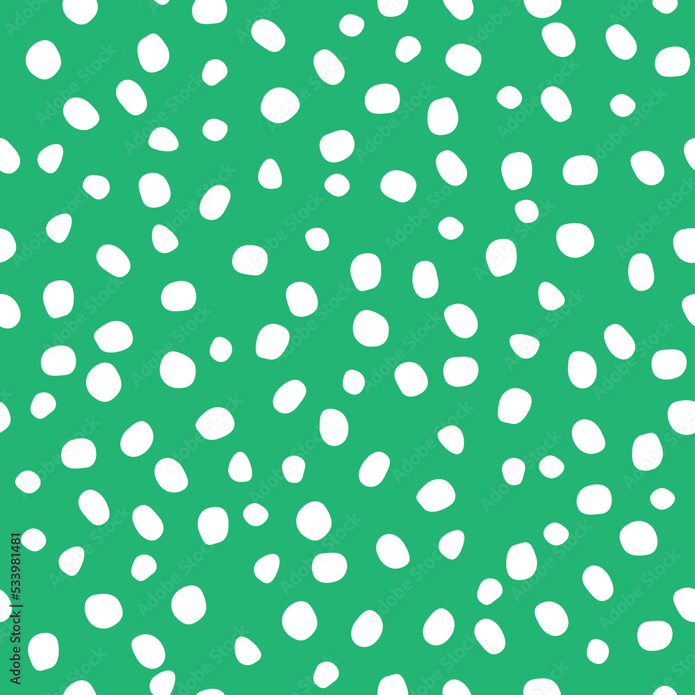 Abstract seamless pattern of hand-drawn white dots-specks on a green background. Different sizes and shapes of white spots (polka dots) on a green background -perfect seamless pattern