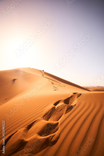 Fototapeta Naklejka Na Ścianę i Meble -  Walking in the Sahara Desert (Morocco Chegaga desert)