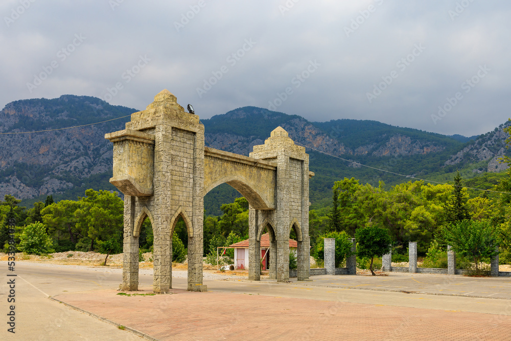 Fototapeta premium Turkish city gate in classical Islamic architecture style. Background with copy space.