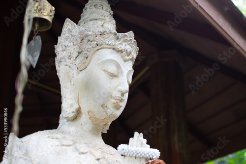 Head of Ancient statue in Temple of Thailand