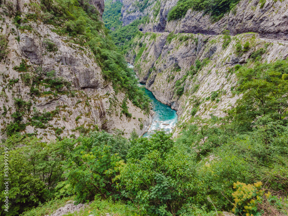 The purest waters of the turquoise color of the river Moraca flowing among the canyons. Travel around Montenegro concept