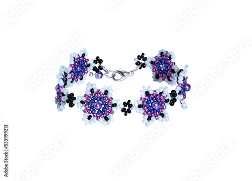 Women's bracelet, woven of blue and lilac beads. Isolated on a white background.