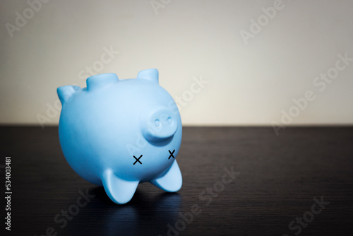 piggy bank inverted, concept of poverty, bankruptcy, crisis and default photo