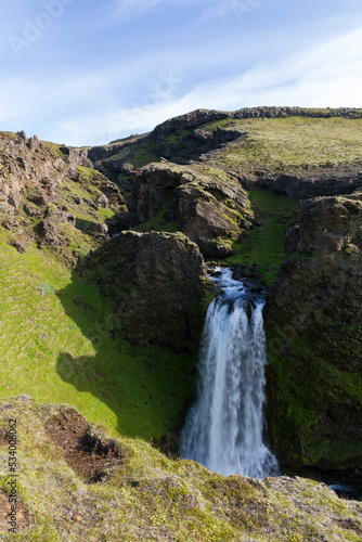 an unknown little waterfall next to the famous Seljalandsfoss waterfall, Iceland