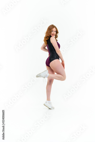 model size posing bodysuit on white background