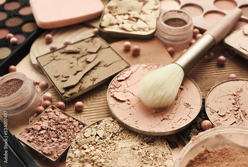 Varieties of face powders and foundations for perfect complexion, basic make up products to even out and matte skin, beauty cosmetics with brushes and sponges, selective focus, toned image
