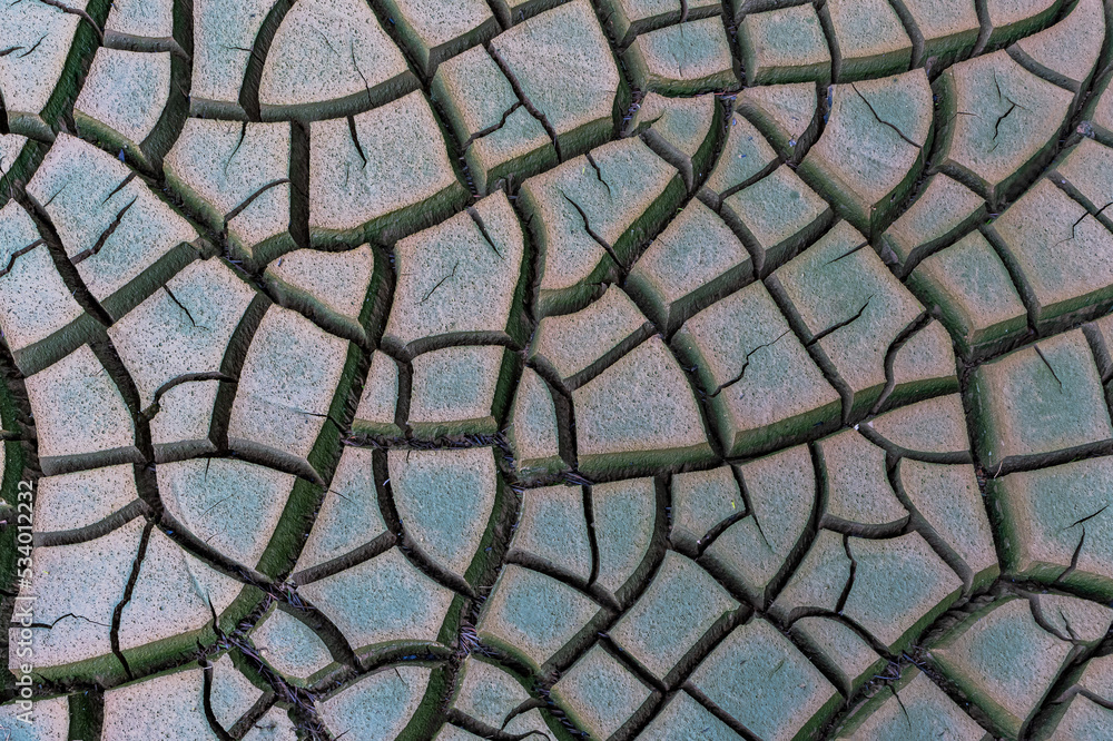 Macro dry deep cracked earth texture surface from hot climate and ...