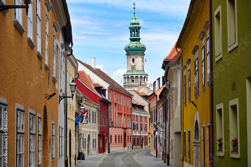 Fényképezés Street with old buildings and Firewatch tower in Sopron Hungary
