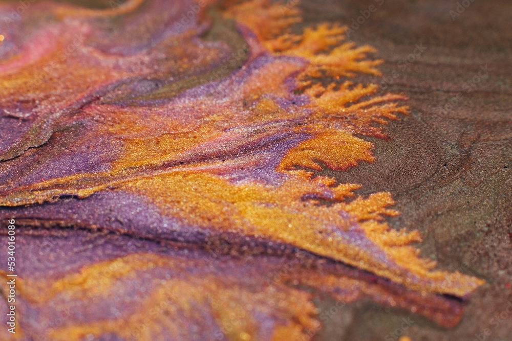 Abstract painting. Acrylic magic. Creative art. Purple orange liquid glitter blend