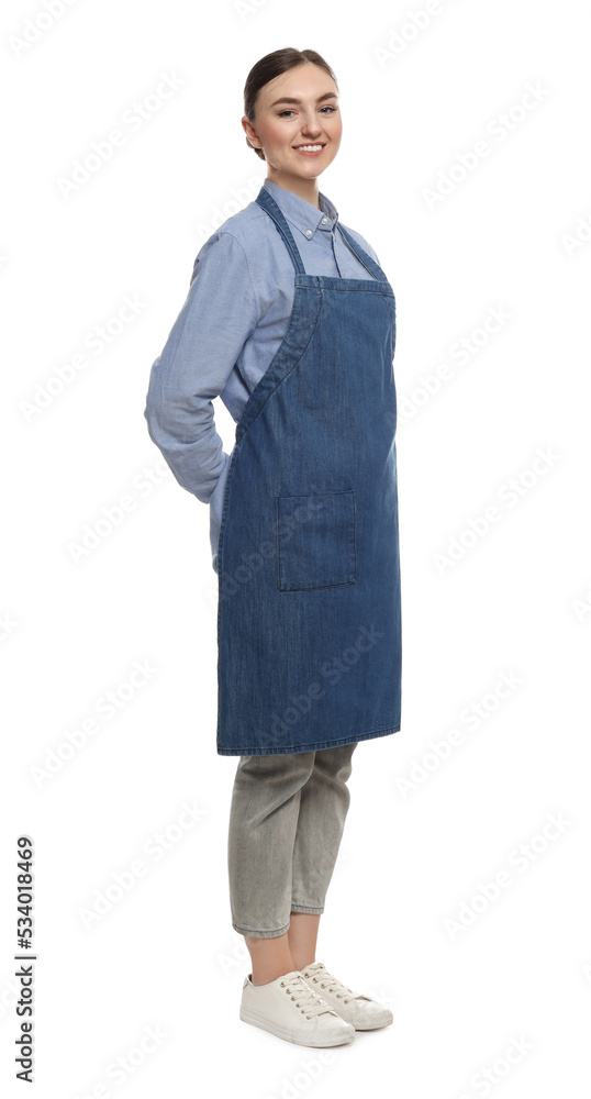 Beautiful young woman in clean denim apron on white background Beautiful young woman in clean denim apron on white background