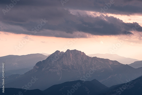 Sunset beams of light on the beautiful mountain peak.