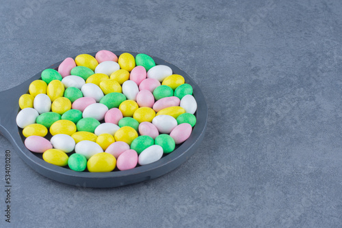 A tray full of gum on the marble background
