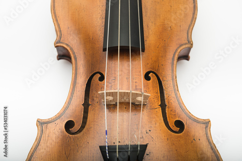 Close up of violin bridge with f-holes.