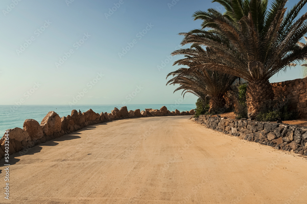 a road along the fuerteventura coast leads to the beach from the various resorts a road along the fuerteventura coast leads to the beach from the various resorts