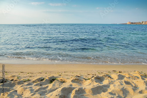 Fototapeta Naklejka Na Ścianę i Meble -  minimalistic seascape in summer. beach sea and horizon. purity in nature