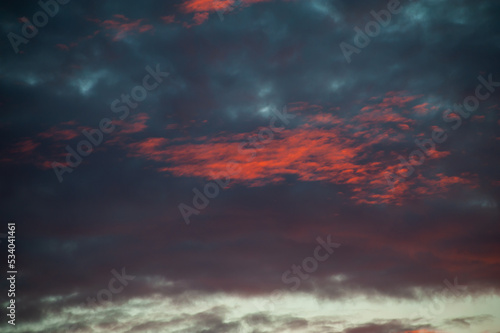 Sunset sunrise with clouds, light rays and other atmospheric effect