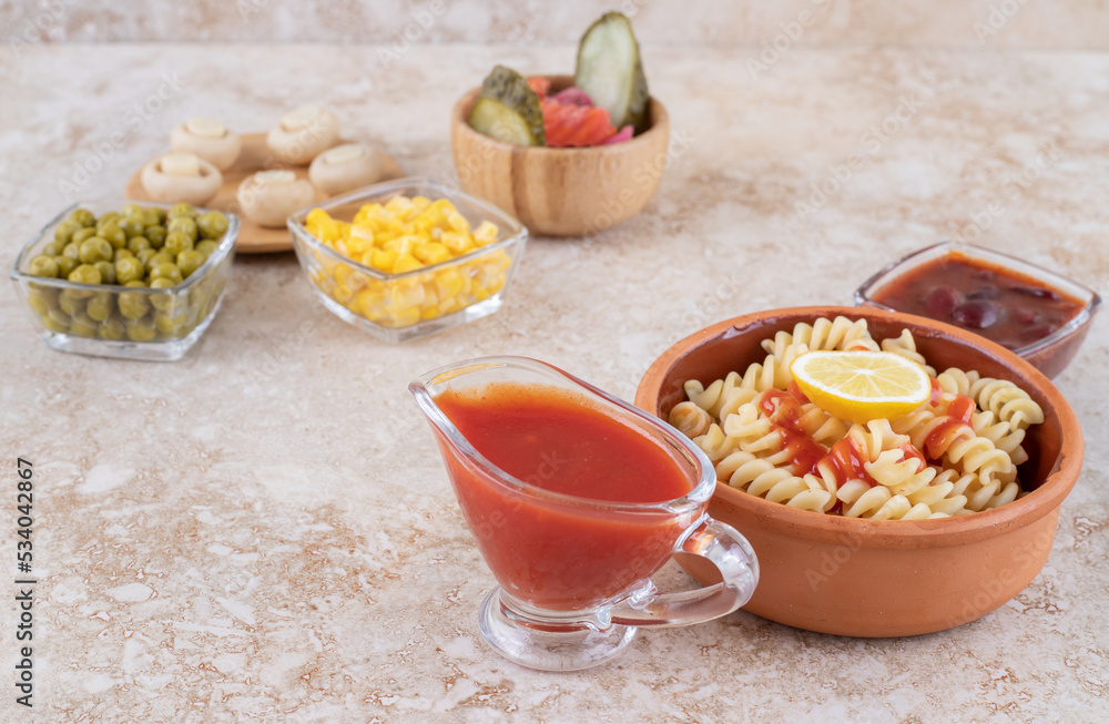 Delicious pasta with mushrooms on a marble background Delicious pasta with mushrooms on a marble background