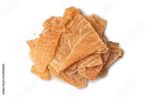 Group of tasty beer snacks. Dehydrated chicken meat slices.