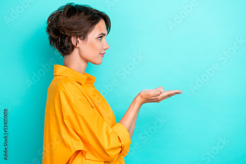 Fotografiet Profile photo of young adorable pretty nice cute woma wear bright shirt hold pal