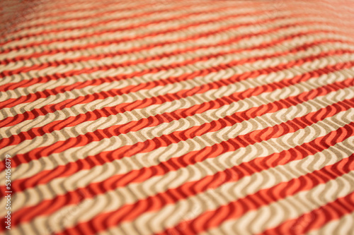 Striped corrugated cardboard texture.