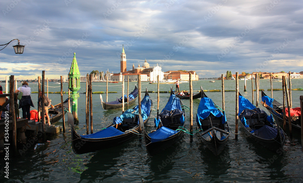 Cityscapes with gondolas in front of San Giorgio Maggiore church in Venice, Italy	

